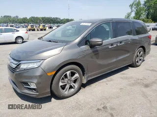 2019 Honda Odyssey Touring с VIN 5FNRL6H87KB098010, выставлен на аукционе Copart как лот 54791505 с пробегом 94 477 миль миль и Списание • Salvage title. История ставок и продаж доступна на DreamBid. Изображение 1.