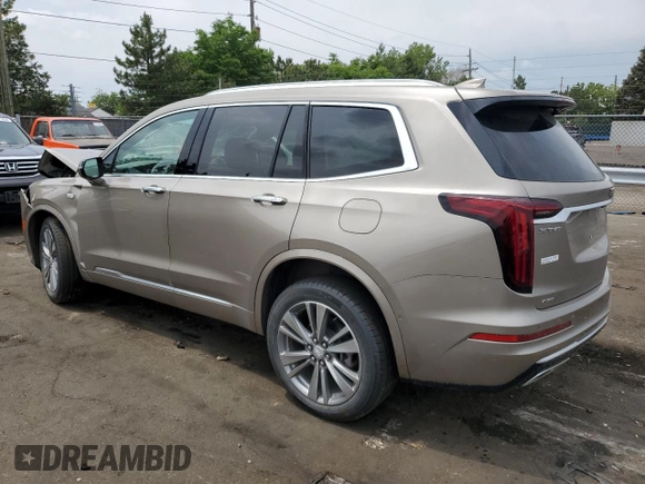2022 Cadillac XT6 Premium Luxury with VIN 1GYKPDRS5NZ180296, listed as a Copart auction lot 59081184 with 21,380 mi miles and Salvage title. Bid and sale history available at DreamBid. Image 2.