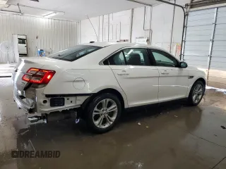 2016 Ford Taurus SEL with VIN 1FAHP2E84GG112803, listed as a Copart auction lot 54372645 with 79,999 mi miles and Salvage Title. Bid and sale history available at DreamBid. Image 3.