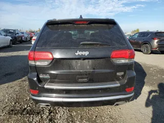 2015 Jeep Grand Cherokee Summit with VIN 1C4RJFJM8FC103117, listed as a Copart auction lot 77695364 with 150,483 mi miles and Salvage Title. Bid and sale history available at carsss.com. Image 6.