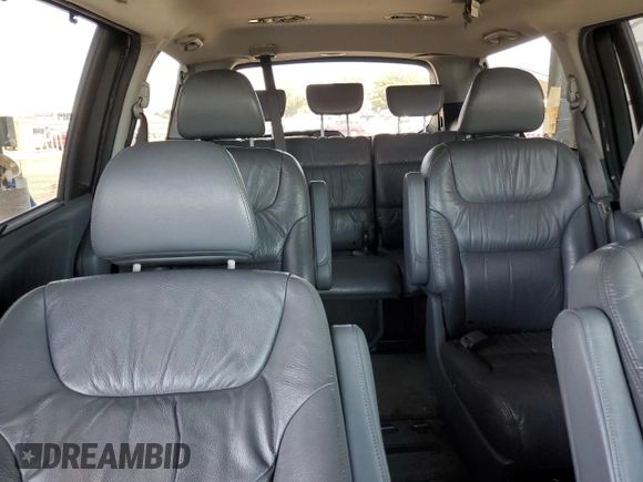2007 Honda Odyssey EX-L z VIN 5FNRL38647B077250, wystawiony jako Copart lot #56925425 z przebiegiem 159 281 mil mil oraz Szkoda całkowita • Salvage title. Historia ofert i sprzedaży dostępna na DreamBid. Obrazek 10.