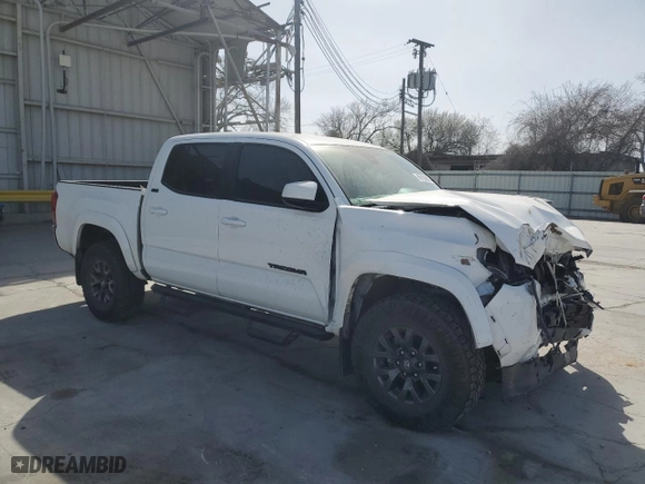 2023 Toyota Tacoma 2WD SR5 with VIN 3TMAZ5CN4PM208565, listed as a Copart auction lot 48159605 with 23,074 mi miles and Salvage Title. Bid and sale history available at carsss.com. Image 4.