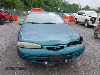 1996 Ford Thunderbird LX z VIN 1FALP62W9TH118637, wystawiony jako IAAI lot #42311641 z przebiegiem 96 361 mil mil oraz . Historia ofert i sprzedaży dostępna na DreamBid. Obrazek 12.