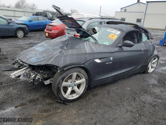2011 BMW Z4 sDrive30i with VIN WBALM5C56BE379790, listed as a Copart auction lot 80991153 with 0 mi miles and Salvage Title. Bid and sale history available at carsss.com. Image 1.