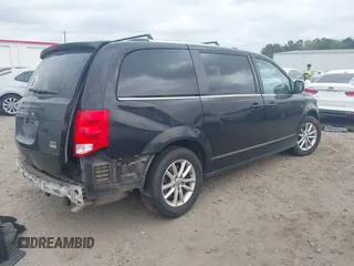 2018 Dodge Grand Caravan SXT with VIN 2C4RDGCGXJR283091, listed as a IAAI auction lot 41966553 with 102,309 mi miles and . Bid and sale history available at DreamBid. Image 4.
