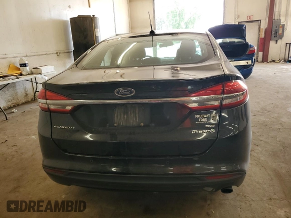 2017 Ford Fusion Hybrid SE z VIN 3FA6P0LU2HR247283, wystawiony jako Copart lot #62571495 z przebiegiem 167 042 mil mil oraz Nie do naprawy • Non repairable. Historia ofert i sprzedaży dostępna na DreamBid. Obrazek 6.