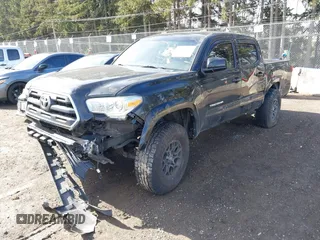 2017 Toyota Tacoma SR5 with VIN 5TFAZ5CN3HX040199, listed as a IAAI auction lot 41734051 with 107,665 mi miles and . Bid and sale history available at carsss.com. Image 16.