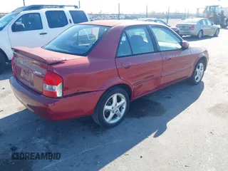 2001 Mazda Protege LX with VIN JM1BJ226310453078, listed as a IAAI auction lot 41683416 with 78,228 mi miles and . Bid and sale history available at DreamBid. Image 4.