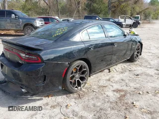 2019 Dodge Charger R/T with VIN 2C3CDXCT0KH742840, listed as a IAAI auction lot 41132315 with 62,136 mi miles and . Bid and sale history available at carsss.com. Image 4.