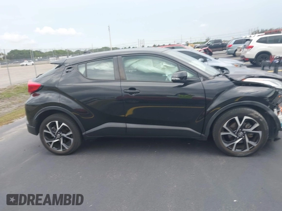 2021 Toyota C-HR LE z VIN NMTKHMBX3MR127202, wystawiony jako IAAI lot #42188312 z przebiegiem 54 029 mil mil oraz . Historia ofert i sprzedaży dostępna na DreamBid. Obrazek 14.