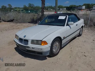 1995 BMW 3 Series 325iC with VIN WBABJ632XSJD40243, listed as a IAAI auction lot 41838410 with 199,909 mi miles. Bid and sale history available at carsss.com. Image 2.