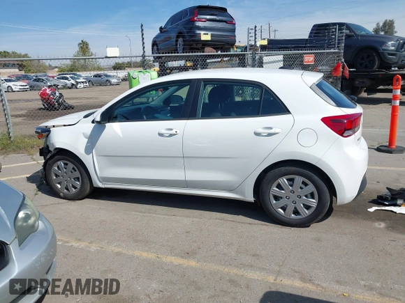 2023 Kia Rio S with VIN 3KPA25AD0PE629868, listed as a IAAI auction lot 41738952 with 25,642 mi miles and . Bid and sale history available at DreamBid. Image 15.