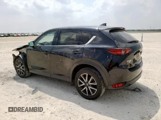 2018 Mazda CX-5 Grand Touring with VIN JM3KFBDM6J0414523, listed as a Copart auction lot 57581145 with 69,353 mi miles and Salvage title. Bid and sale history available at DreamBid. Image 2.