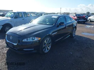 2015 Jaguar XJ with VIN SAJWA1CZ2F8V84677, listed as a IAAI auction lot 41723372 with 52,888 mi miles. Bid and sale history available at carsss.com. Image 17.