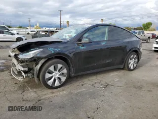 2023 Tesla Model Y Long Range with VIN 7SAYGDEE8PF877926, listed as a Copart auction lot 44342645 with 41,408 mi miles and Salvage Title. Bid and sale history available at DreamBid. Image 1.