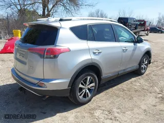 2017 Toyota RAV4 XLE with VIN 2T3RFREV1HW561295, listed as a IAAI auction lot 42049546 with 97,576 mi miles. Bid and sale history available at carsss.com. Image 4.
