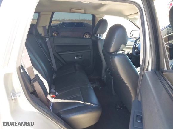 2010 Jeep Grand Cherokee Laredo with VIN 1J4PS4GK1AC111965, listed as a IAAI auction lot 41776362 with 209,042 mi miles. Bid and sale history available at carsss.com. Image 8.