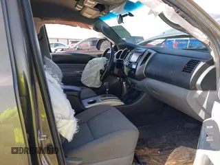 2015 Toyota Tacoma with VIN 5TFLU4ENXFX139145, listed as a IAAI auction lot 41822079 with 146,842 mi miles. Bid and sale history available at carsss.com. Image 5.