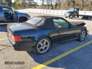 1999 Mercedes-Benz SL-Class with VIN WDBFA68F0XF175888, listed as a Copart auction lot 85984514 with 97,975 mi miles and Salvage Title. Bid and sale history available at carsss.com. Image 3.