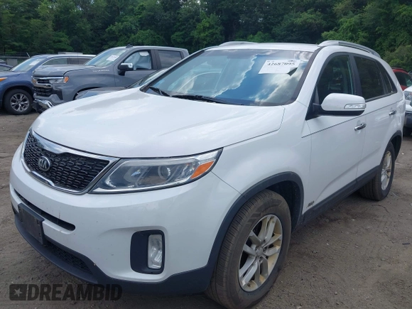 2015 Kia Sorento LX with VIN 5XYKTDA6XFG640536, listed as a IAAI auction lot 42687095 with 142,816 mi miles and . Bid and sale history available at DreamBid. Image 2.