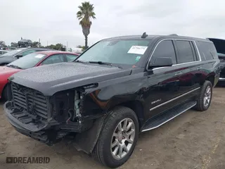 2020 GMC Yukon XL Denali with VIN 1GKS1HKJ8LR181119, listed as a IAAI auction lot 41794775 with 206,337 mi miles. Bid and sale history available at carsss.com. Image 2.