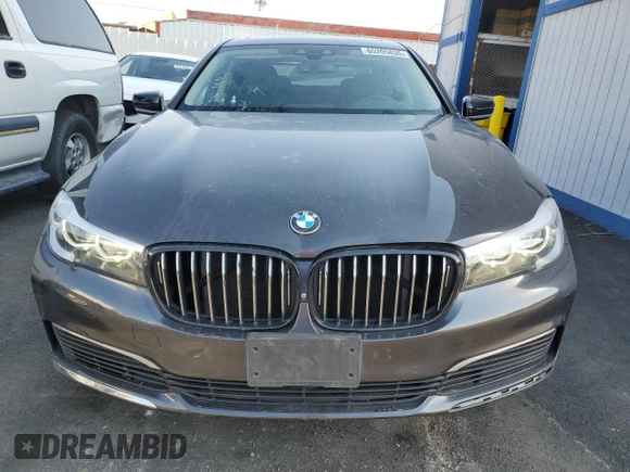 2019 BMW 7 Series 740i with VIN WBA7E2C52KB217153, listed as a Copart auction lot 65205835 with 61,981 mi miles and Clean title. Bid and sale history available at DreamBid. Image 5.