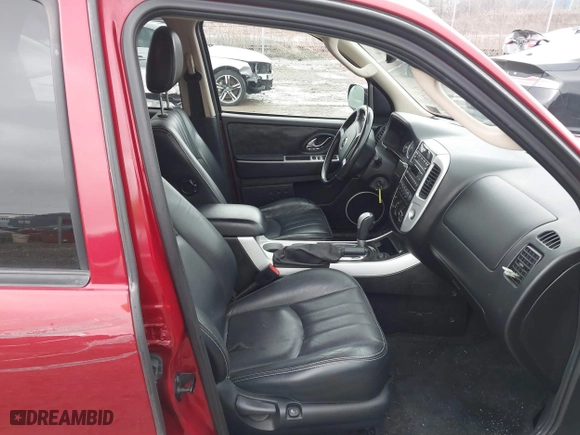 2005 Mercury Mariner Luxury with VIN 4M2YU57145DJ07713, listed as a IAAI auction lot 41678767 with 71,981 mi miles. Bid and sale history available at carsss.com. Image 5.