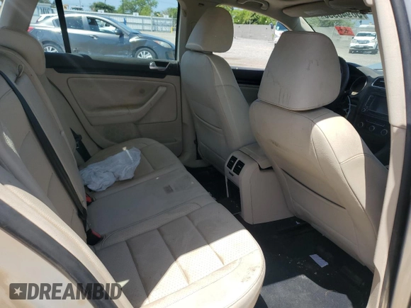 2010 Volkswagen Jetta TDI z VIN 3VWTL7AJ0AM654626, wystawiony jako Copart lot #56940995 z przebiegiem 196 928 mil mil oraz Szkoda całkowita • Salvage title. Historia ofert i sprzedaży dostępna na DreamBid. Obrazek 11.