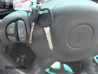 2003 Pontiac Bonneville SE z VIN 1G2HX52K834148229, wystawiony jako IAAI lot #42300423 z przebiegiem 120 546 mil mil oraz . Historia ofert i sprzedaży dostępna na DreamBid. Obrazek 11.