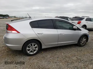 2010 Honda Insight EX with VIN JHMZE2H71AS039108, listed as a Copart auction lot 54557145 with 151,230 mi miles and Salvage title. Bid and sale history available at DreamBid. Image 3.