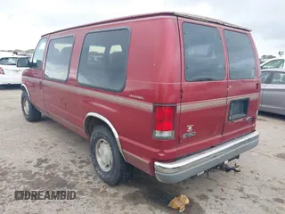 1999 Ford Econoline Cargo with VIN 1FDRE14W0XHB06565, listed as a IAAI auction lot 41496511 with 165,268 mi miles. Bid and sale history available at carsss.com. Image 3.