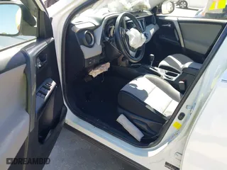 2016 Toyota RAV4 XLE with VIN JTMWFREV3GJ082487, listed as a IAAI auction lot 41833158 with 107,332 mi miles. Bid and sale history available at carsss.com. Image 5.