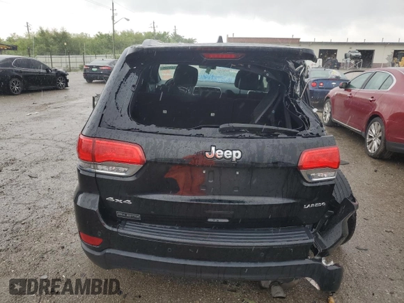 2018 Jeep Grand Cherokee Laredo E with VIN 1C4RJFAG5JC113283, listed as a Copart auction lot 57569595 with 90,897 mi miles and Salvage title. Bid and sale history available at DreamBid. Image 6.
