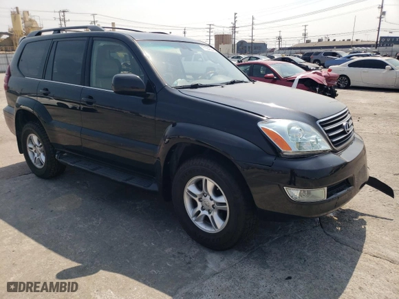 2004 Lexus GX 470 with VIN JTJBT20XX40068513, listed as a Copart auction lot 71554824 with 208,790 mi miles and Salvage Title. Bid and sale history available at carsss.com. Image 4.