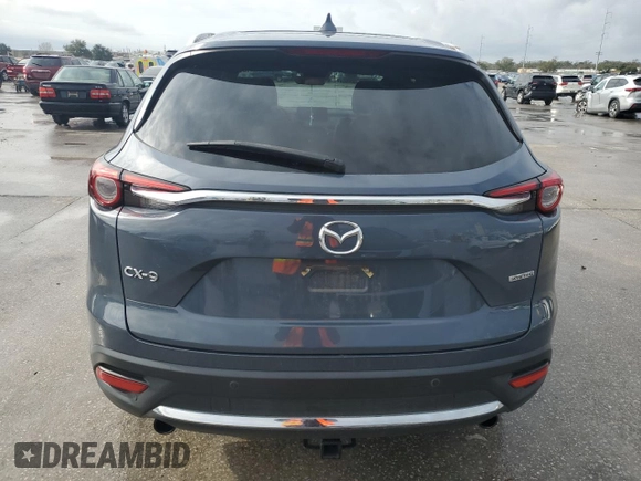 2021 Mazda CX-9 Grand Touring z VIN JM3TCADYXM0519757, wystawiony jako Copart lot #86665134 z przebiegiem 51 217 mil mil oraz Szkoda całkowita • Salvage title. Historia ofert i sprzedaży dostępna na DreamBid. Obrazek 6.
