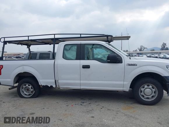 2015 Ford F-150 XL z VIN 1FTEX1C86FKE30797, wystawiony jako IAAI lot #41406907 z przebiegiem 177 541 mil mil oraz . Historia ofert i sprzedaży dostępna na DreamBid. Obrazek 13.