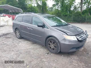 2011 Honda Odyssey EX-L with VIN 5FNRL5H63BB072156, listed as a IAAI auction lot 42212001 with 175,351 mi miles and . Bid and sale history available at DreamBid. Image 1.