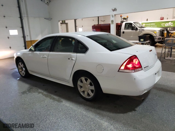 2014 Chevrolet Impala Limited Police Police with VIN 2G1WD5E33E1167570, listed as a Copart auction lot 83104454 with 120,649 mi miles and Clean Title. Bid and sale history available at carsss.com. Image 2.