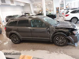 2018 Dodge Journey SE with VIN 3C4PDCAB9JT428917, listed as a IAAI auction lot 41578750 with 136,886 mi miles and . Bid and sale history available at DreamBid. Image 13.