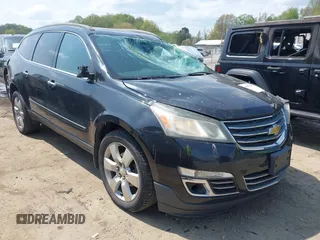 2013 Chevrolet Traverse LTZ z VIN 1GNKVLKDXDJ219261, wystawiony jako IAAI lot #42097843 z przebiegiem 152 478 mil mil oraz . Historia ofert i sprzedaży dostępna na DreamBid. Obrazek 1.