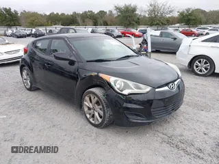 2016 Hyundai Veloster z VIN KMHTC6AD0GU248689, wystawiony jako IAAI lot #41559895 z przebiegiem 91 111 mil mil oraz . Historia ofert i sprzedaży dostępna na DreamBid. Obrazek 1.