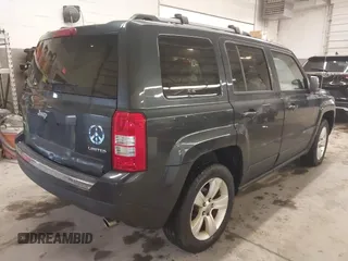 2014 Jeep Patriot Limited with VIN 1C4NJRCB7ED684811, listed as a IAAI auction lot 41833010 with 74,820 mi miles and . Bid and sale history available at carsss.com. Image 4.
