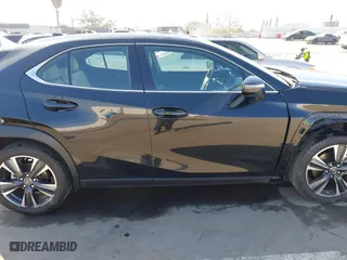 2024 Lexus UX with VIN JTHX6JBH7R2162231, listed as a IAAI auction lot 41665179 with 21,913 mi miles. Bid and sale history available at carsss.com. Image 14.