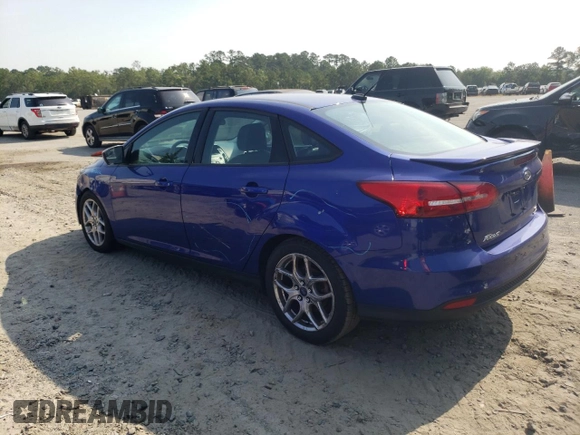2015 Ford Focus SE with VIN 1FADP3F2XFL299193, listed as a Copart auction lot 59744715 with 141,317 mi miles and Salvage title. Bid and sale history available at DreamBid. Image 2.
