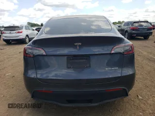 2022 Tesla Model Y Long Range with VIN 7SAYGDEE3NA007737, listed as a Copart auction lot 64602984 with 42,597 mi miles and Salvage Title. Bid and sale history available at carsss.com. Image 6.