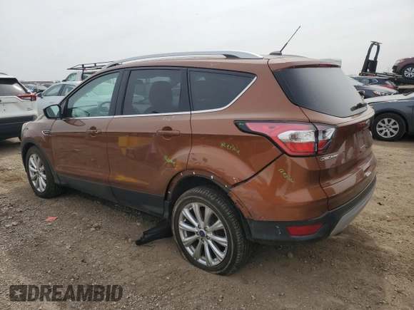 2017 Ford Escape Titanium with VIN 1FMCU0JD4HUC85921, listed as a Copart auction lot 51490945 with 90,093 mi miles and Salvage Title. Bid and sale history available at carsss.com. Image 2.