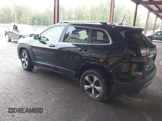 2019 Jeep Cherokee Limited with VIN 1C4PJMDX7KD137829, listed as a IAAI auction lot 42437417 with 143,214 mi miles and . Bid and sale history available at DreamBid. Image 3.