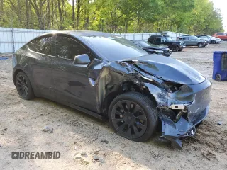 2024 Tesla Model Y Long Range с VIN 7SAYGDEE9RA230998, выставлен на аукционе Copart как лот 51682025 с пробегом Не указан миль и Списание • Salvage title. История ставок и продаж доступна на DreamBid. Изображение 4.