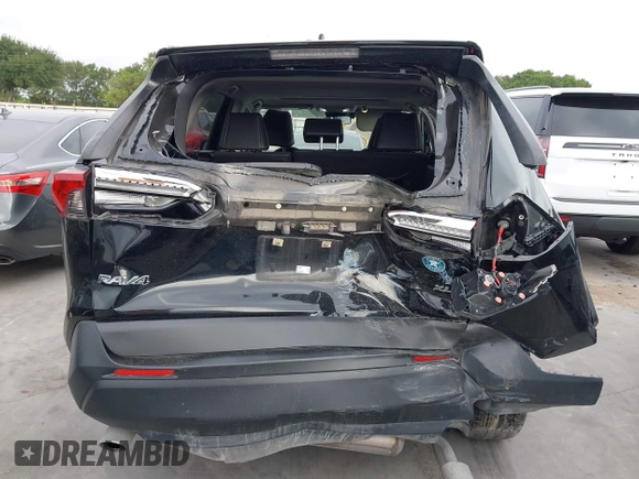 2022 Toyota RAV4 XLE Premium with VIN JTMC1RFV0ND085813, listed as a IAAI auction lot 42152401 with 86,707 mi miles and . Bid and sale history available at DreamBid. Image 16.