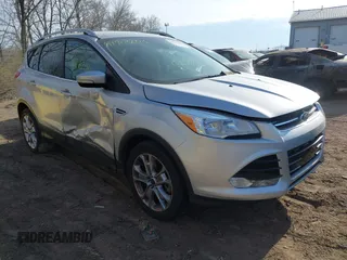 2015 Ford Escape Titanium z VIN 1FMCU0J91FUC41531, wystawiony jako IAAI lot #41903203 z przebiegiem 118 962 mil mil oraz . Historia ofert i sprzedaży dostępna na DreamBid. Obrazek 1.